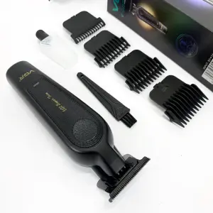 Аккумуляторная машинка для стрижки VGR V-995 + 4 насадки, 2000 мАч, USB